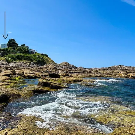 Olardasolas - Casa Con Jardin Privado Frente Al Mar, Hébergement de vacances Porto do Son